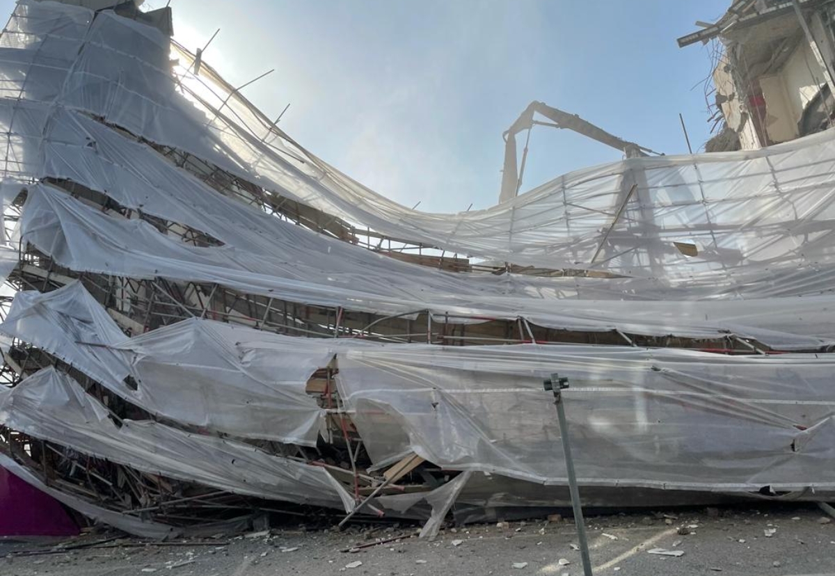 Emergency services had to close off streets to clear hoardings and building debris from the street