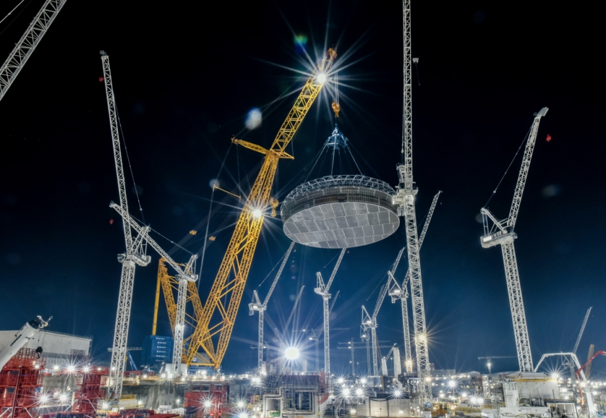 A 170 tonne prefabricated part of the reactor’s steel containment liner for reactor unit 1 being lifted into place