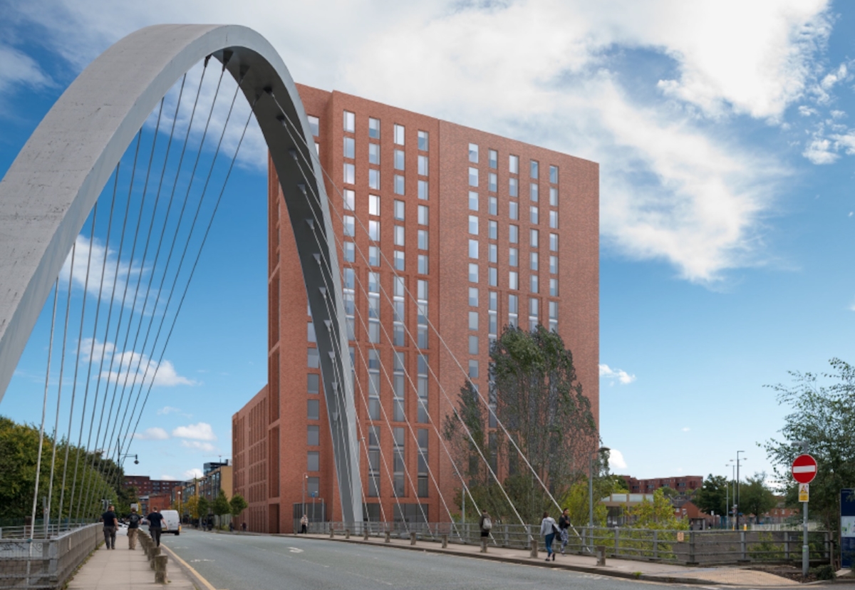 The site, known as Plot E, sits close to the Hulme Arch on Stretford Road 