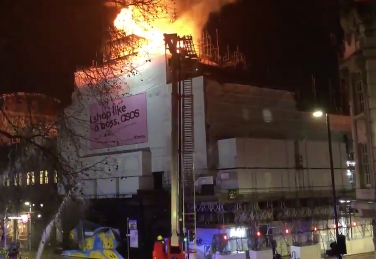 Fire breaks out on the main roof dome which was being refurbished and reclad in copper