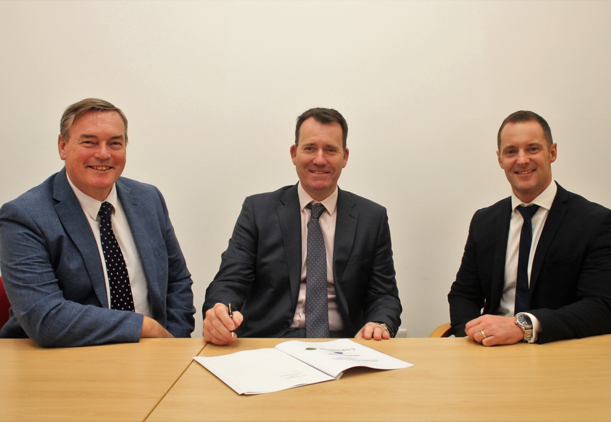 The new collaboration agreement is signed by (from left to right) Stuart Herritty, Director of G M Treble; Phil Leech, Managing Director of J S Wright; and Glynn Williams, Director of Sales, Commercial Building Services for Grundfos Pumps