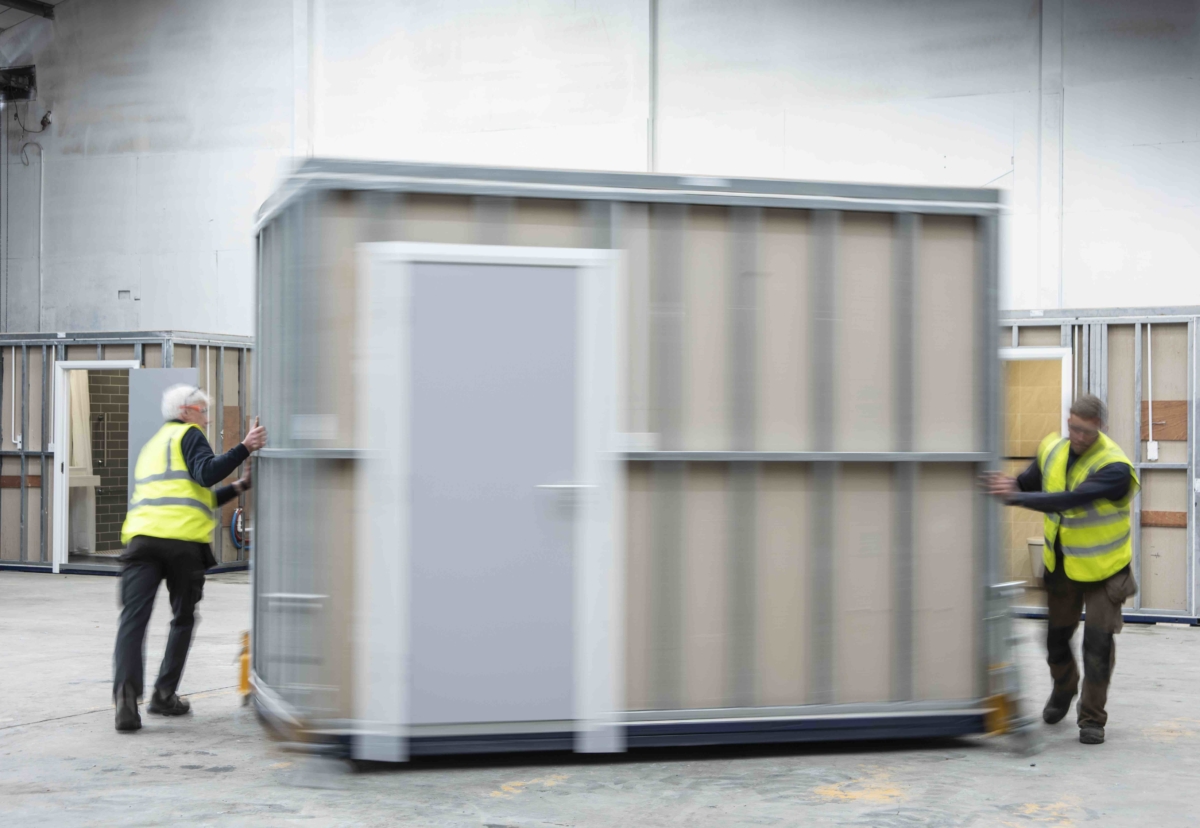 Pods are completely finished, walk-in bathrooms that are shrink wrapped on the factory floor