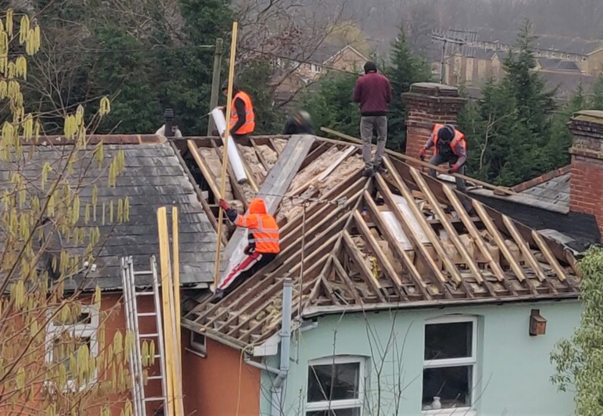 The workers had been renovating the roof of a property in Surrey