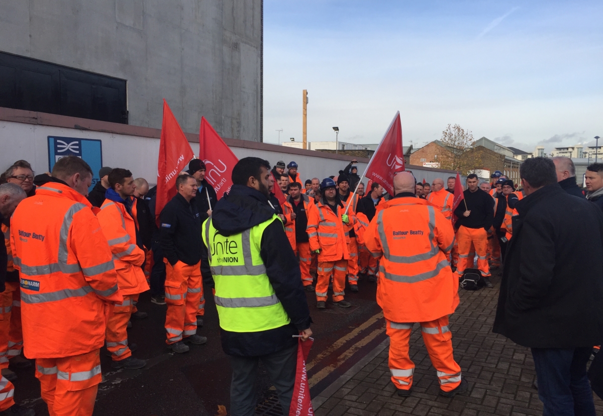Electricians staged a mass meeting at the Woolwich site this week