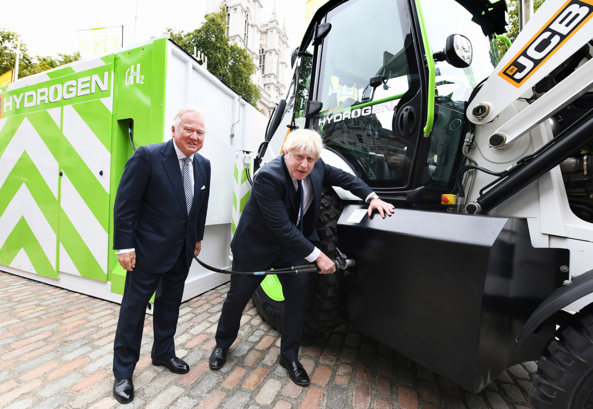 Boris Johnson refuels JCB's prototype hydrogen powered backhoe loader as the company announces a  £100 million investment in hydrogen engine production.