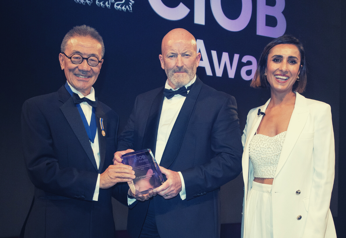 Pictured at last year's event: Construction Manager of the Year Joe O’Connell (centre), with CIOB president Michael Yam (left), and TV presenter Anita Rai