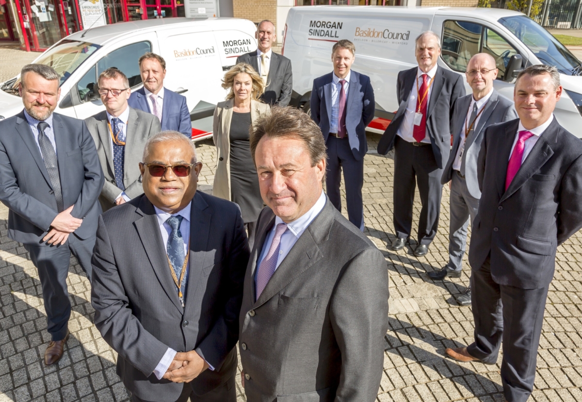 Chief executive of Basildon Council, Bala Mahendran, front left and John Morgan, chief executive of Morgan Sindall Group, front right, with representatives from Basildon Council and Morgan Sindall Property Services