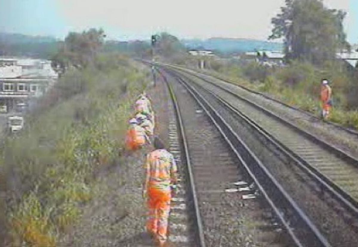 CCTV image shows the moment just seconds before a railway worker was struck
