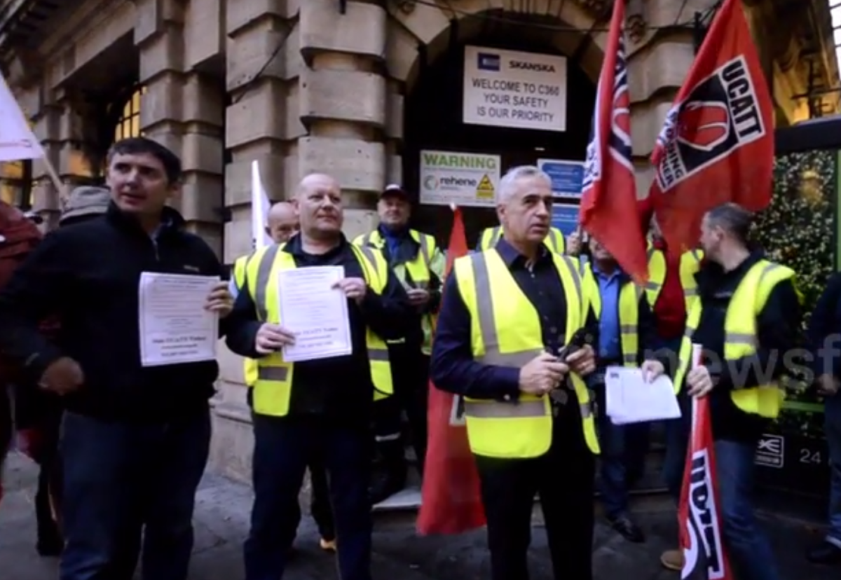 Construction union UCATT stages protest outside central London Crossrail entrance