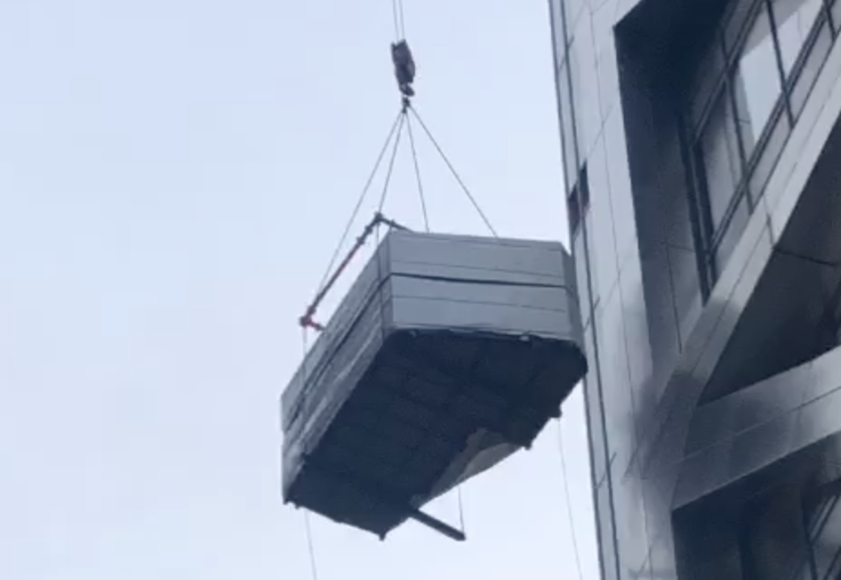 Bathroom pod bumps into the neighbouring Heron Tower