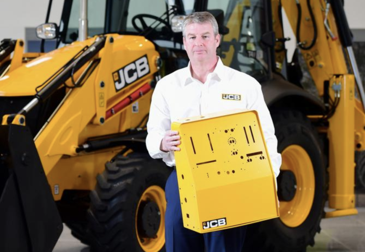 JCB chief innovation and growth officer Tim Burnhope pictured with the ventilator housing prototypes