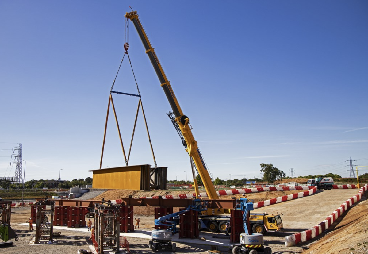 The assembled steel bridge structure will span the M42