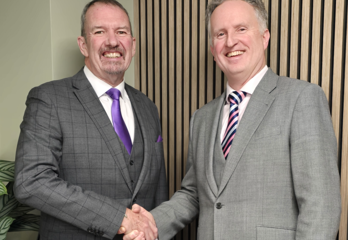 Michael Conlon (right) hands over baton as chair to Guy Parker (left)