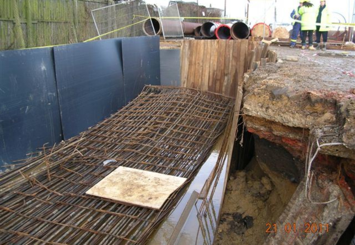 The partially-built steel reinforcement structure after it collapsed