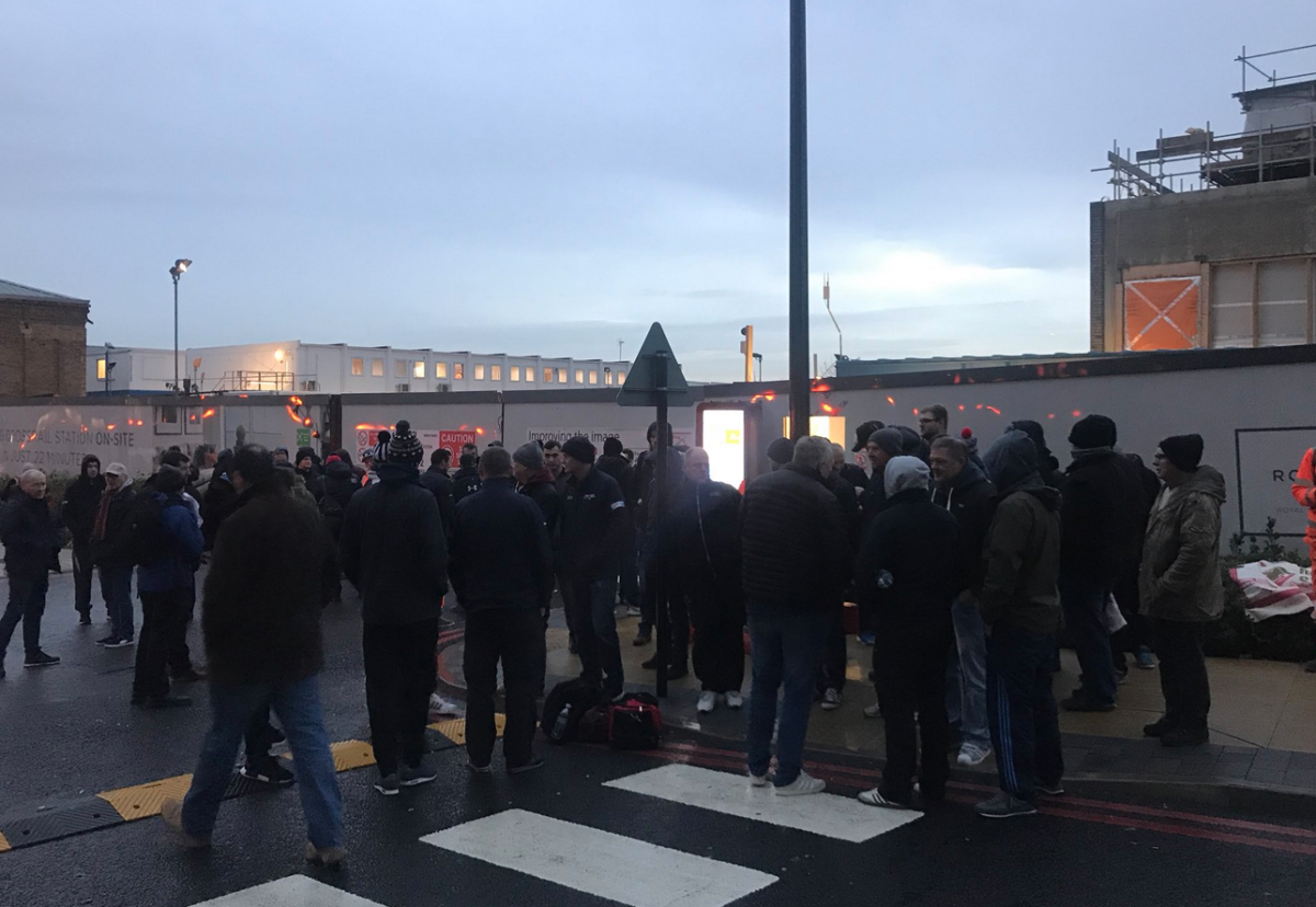 Electricians stage a protest at the site on Wednesday morning