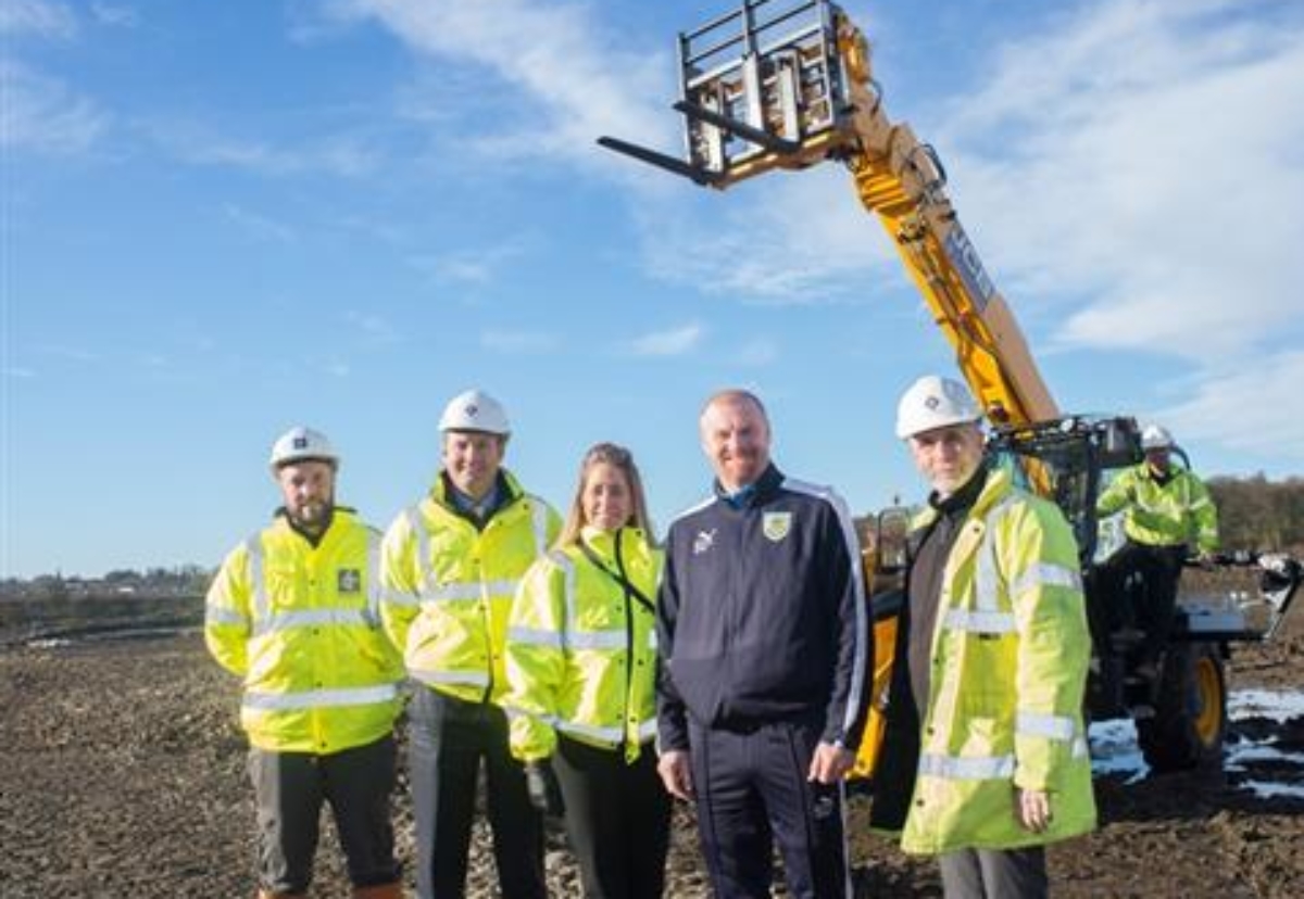 Pictured, as work commences at the Barnfield Training Centre, are Burnley FC manager Sean Dyche and some of the workers from Barnfield Construction