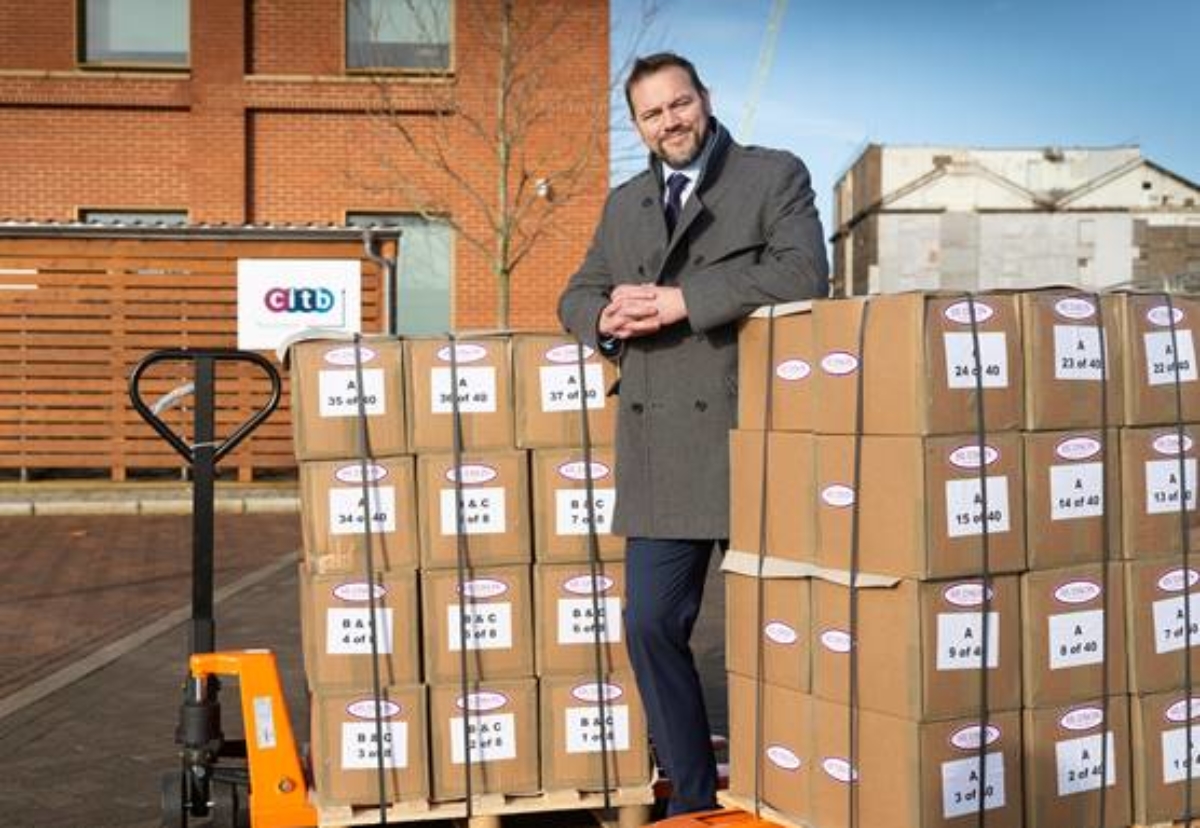 Hudson managing director Ian Anfield delivers two pallet loads of evidence backing its claim for £10.5m back in training grants