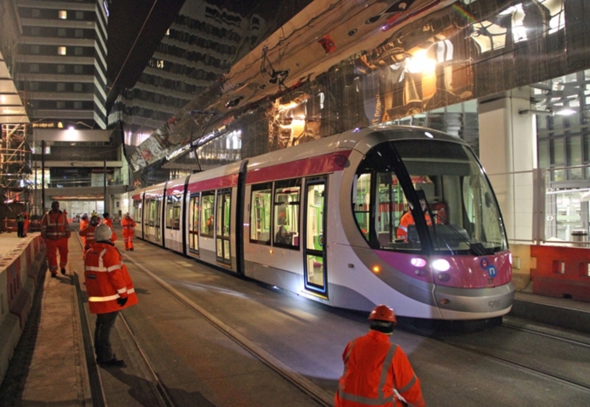 A Midland Metro tram undergoing testing arrives at New Street station