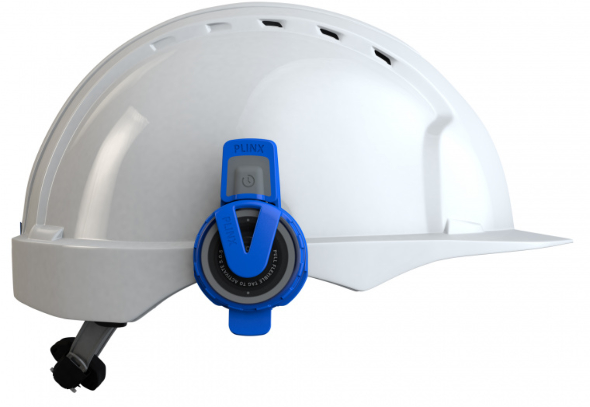 Hard hat fitted with social distancing alarm