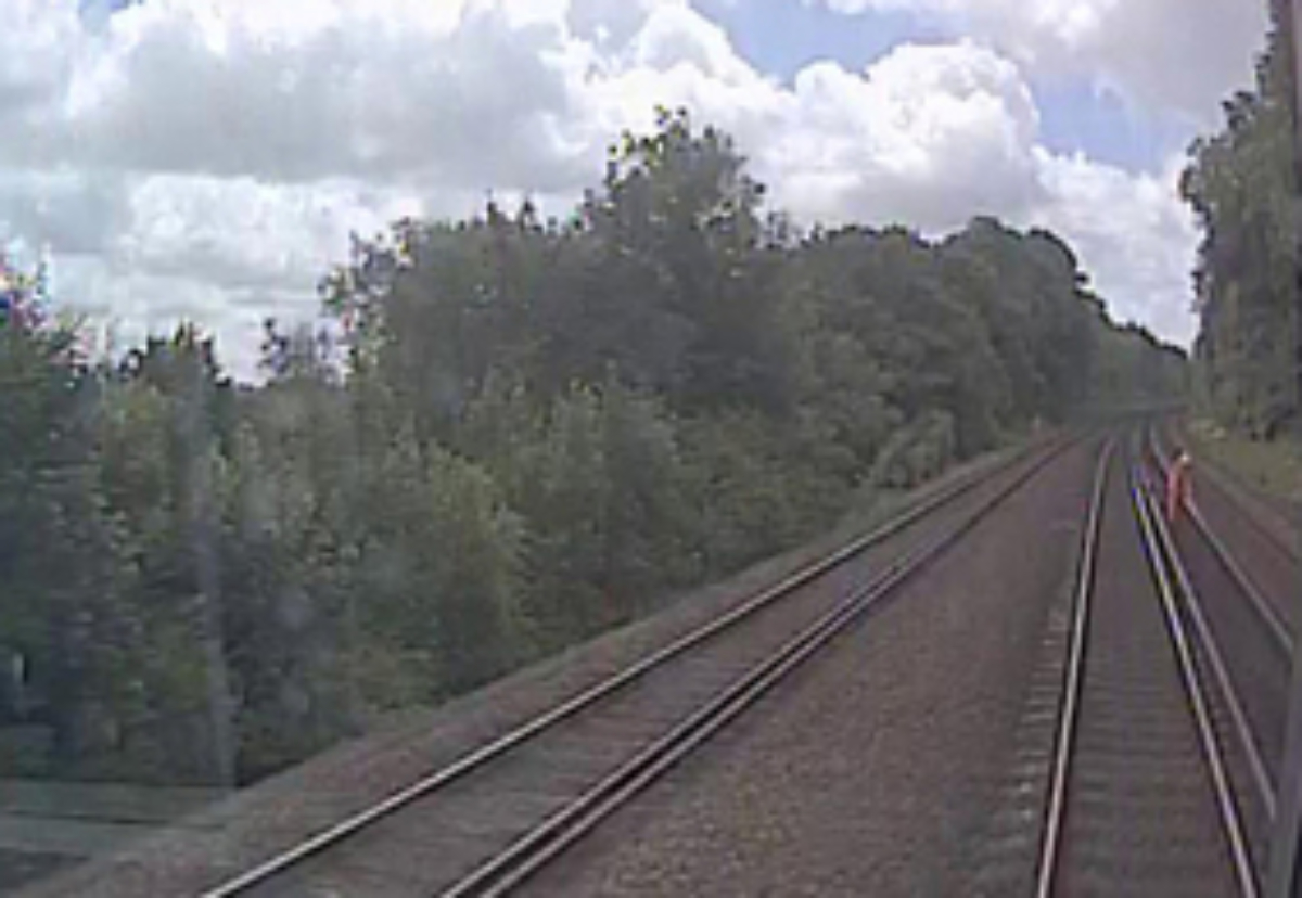 CCTV in the driver's cab shows the worker ahead on the tracks