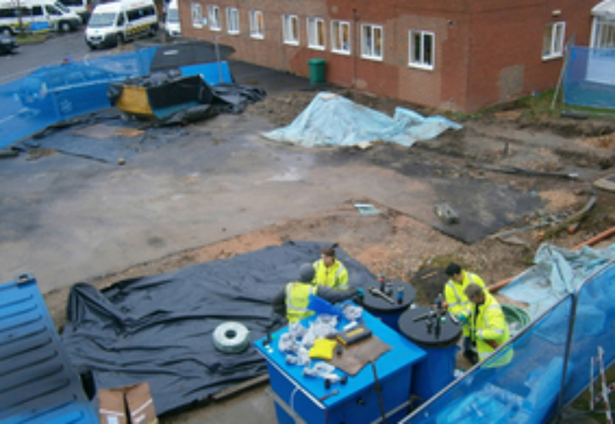 Environment Agency officers investigating the diesel oil spillage